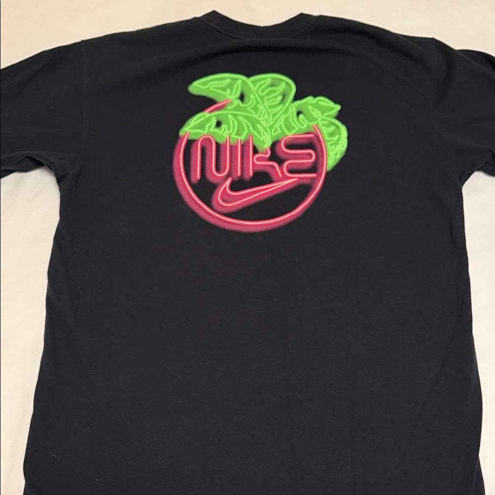 Nike Black Tee with Vibrant Pink and Green Design
